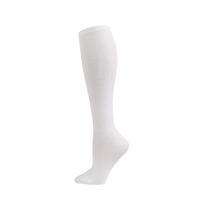 Xianghui vente en gros chaussettes hautes en coton respirant en uniforme scolaire uni blanc et noir approprié pour une utilisation quotidienne d'automne
