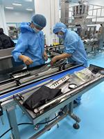 Machine d'emballage automatique de sachets préformés pour le remplissage de granulés, la fermeture de sacs à fermeture éclair et l'emballage de sachets stand-up pour dattes rouges séchées