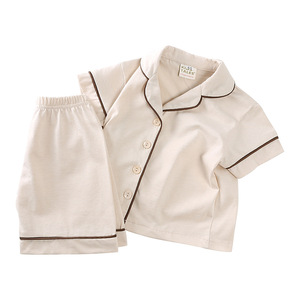 Ensemble décontracté de style danois pour garçons et filles Pyjama d'été en coton doux Motif solide Tissu peigné - Product Image 2