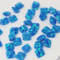 Opale synthétique de couleur bleue, ronde et brillante