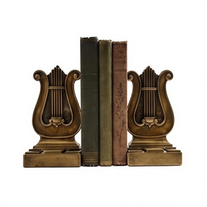 Serre-livres décoratifs modernes en métal doré antique, texture moulée, pour bibliothèque et bureau - Product Image 1