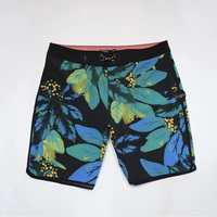 Shorts de bain noirs à sublimation en promotion – Vente en gros de shorts de surf et de maillots de bain design
