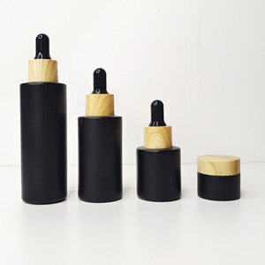 Wholesale 60ml Flat Shoulder <b>Essential</b> <b>Oil</b> Dropper Bottle Customizable Logo White Rubber Dropper Wood Grain Collar Glass Bottles - Product Image 3