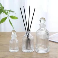 Bouteille en verre sérigraphiée rayée 50 ml avec joint en caoutchouc rond pour cosmétiques, huiles essentielles, parfums – Vente en gros directe usine