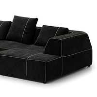 Canapé modulaire en forme de L, style moderne minimaliste, obsidienne noire et blanche, surpiqûres contrastées, pour grand appartement