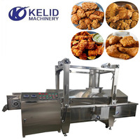 Machine à frire la viande continue écorces de porc Brosted poulet frite Machine viande friteuse continue électrique