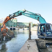 Marteau vibrant hydraulique monté sur excavatrice KN200 pour le battage de pieux tubulaires et de pieux-plaques
