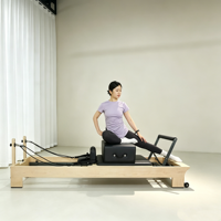 Nouvelle Tendance : Reformer Pilates avec Barre Intégrée et Barre de Repose-Pieds en Bois d'Érable – Équipement de Fitness en Bois pour Studio de Yoga