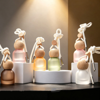 Vente en gros de flacons de parfum cylindriques pour voiture de 10 ml, flacons de parfum suspendus multicolores pour voiture, logo personnalisé
