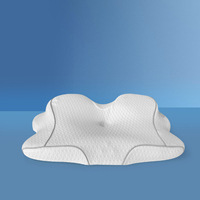 Oreiller ergonomique en mousse à mémoire de forme pour l'alignement de la colonne vertébrale et la traction cervicale