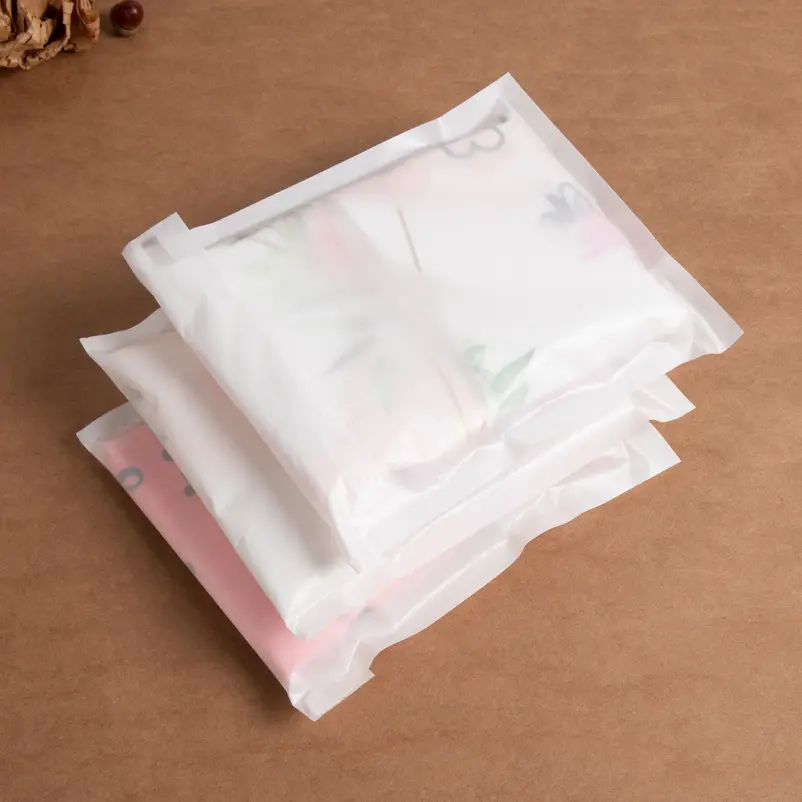 カスタムガーメントグラシンワックス紙袋環境にやさしい衣類包装堆肥化可能な透明グラシンペーパーバッグ