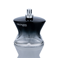 Nouveau design de bouteille de parfum en verre de 100ml de forme unique avec dégradé noir de luxe avec pulvérisateur