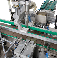 Machine de remplissage et de capsulage de diffuseurs Yide YD-21 avec pressage de bouchons internes, écran tactile PLC et alimentation vibratoire des bouchons