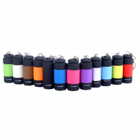 Mini porte-clés rechargeable USB haute puissance lampe de poche minuscule étanche avec ampoule LED corps de lampe ABS cote IP65
