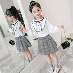 ชุดกระโปรงและเสื้อครอปสำหรับเด็กผู้หญิง ดีไซน์สวยเก๋สำหรับฤดูร้อน ขายส่ง ชุดเซ็ต 2 ชิ้น เสื้อครอปและกระโปรง - Product Image 5