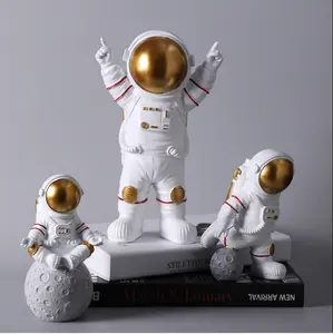 Home Decor Artificial Resin Astronaut Figurines Modern Spaceman With Moon Sculpture Statues Decorative Arts And Crafts
