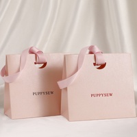 Ventes chaudes Sac à main en papier de qualité supérieure Couleur rose Ensemble d'emballage de bijoux avec sac et boîte Fabrication de sacs en papier personnalisés