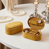 Boîte à bijoux en cuir PU de haute qualité, personnalisée, en gros, mini-organisateur de voyage pour boucles d'oreilles et bagues, petite étui ovale en cuir