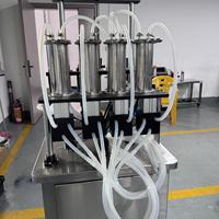 Machine de remplissage et de bouchage semi-automatique pneumatique à 4 têtes Zhongjie pour cosmétiques et parfums, contrôle PLC, haute sécurité