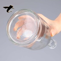 Bouteille en verre de 500 ml pour spiritueux avec bouchon à vis, forme ronde, option d'impression sérigraphique personnalisée pour l'emballage de spiritueux, whisky, brandy