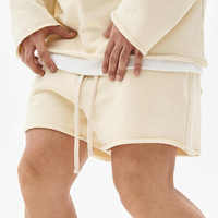 Shorts de sport amples et décontractés pour l'été, style streetwear, avec ourlet brut personnalisé, par Essentials