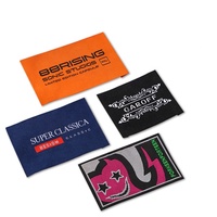 Étiquettes tissées personnalisées de qualité supérieure - Chaîne d'approvisionnement conforme à la norme FAMA - Matériaux conformes à la norme Oeko-Tex Standard 100 - Artisanat de maîtrise - Service OEM