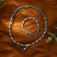 Collier pendentif perle noire, bracelet perle d'eau douce naturelle turquoise, ensemble de bijoux élégant et classique pour femmes, idéal pour les rendez-vous