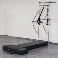 Unité Murale de Pilates Haute Performance : Reformer Suspendu, Springboard et Planche Murale pour Studio