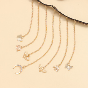 Chaîne de corps élastique imprimé léopard avec pampille dorée et pendentifs papillon, éléphant, lune pour femme – Idéale pour la plage - Product Image 4