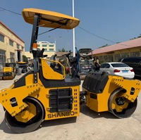 Rouleau compacteur de 5 tonnes testé en usine, moteur à faible consommation de 36,8 kW, idéal pour le compactage des sols en ingénierie