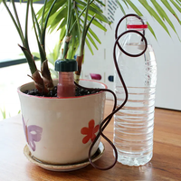 Arroseur automatique en plastique Gamry pour plantes, pot d'arrosage vert pour l'irrigation du jardin avec libération lente et design unique