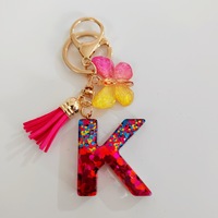 Porte-clés en résine scintillante colorée KC370 avec fleur et pompon, breloque de sac