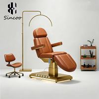 Lit d'esthétique électrique sur mesure, inclinable, avec base dorée et éclairage LED, 3 moteurs, ergonomique, pour soins du visage et spa