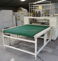 Machine à coudre entièrement automatique pour panneaux rigides et matelas en laine de roche minérale souple et fibre de verre