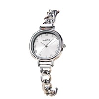 Nouvelle montre à quartz de luxe pour femme avec boîtier en acrylique écologique et bracelet en alliage, style Instagram, élégante, boîtier ovale de niche, fermoir bijou
