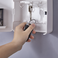Porte-clés magnétique Boîte en plastique Porte-clés blanc Maison noir Étagère à clés pour le rangement des clés sur le mur