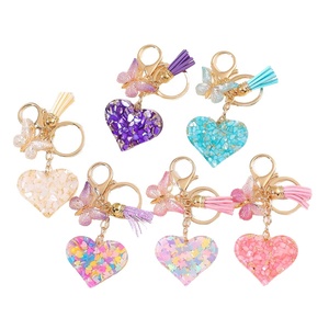 Llavero de mosquetón con colgante de letras con flecos brillantes estilo caricatura para mujer, de aleación de zinc, duradero, ligero, regalo perfecto para festivales - Product Image 1