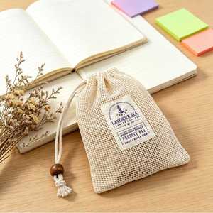 Bolsa de malla de algodón orgánico impresa a máquina, la más vendida, con doble cordón y borlas de cuentas de madera, cierre ajustable; 100% algodón - Product Image 4