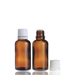 1 oz 30ml Amber Round Essential Oil Glass <b>Bottle</b> With White <b>Plastic</b> Screw Cap - Product Image 1