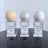 Flacon de parfum en verre transparent carré de luxe de 15 ml, mini flacon pulvérisateur version Q en stock