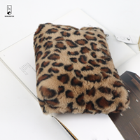 Trousse de maquillage en fausse fourrure à imprimé léopard personnalisée en usine Pochette de beauté de voyage ultra douce de haute qualité