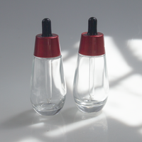 Flacon compte-gouttes en verre cylindrique pour huile essentielle cosmétique de luxe personnalisé 30 ml 50 ml avec bouchon rouge, flacon compte-gouttes en verre pour sérum cosmétique
