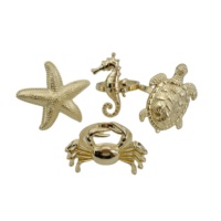 Lot de 4 Anneaux de Serviette en Métal Thème Vie Marine (Étoile de Mer, Hippocampe, Crabe, Tortue) – Série Océan Écologique Haut de Gamme pour Fêtes, Emballage Sac OPP