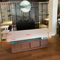 Table de massage électrique de luxe Zhuolie à 4 moteurs, cadre en bois flottant moderne, chauffante, pour usage commercial en salon de bien-être