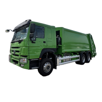 Sinotruk Howo 20 CBM chargeur arrière compacteur camion à ordures 6x4 manuel diesel comprimé déchets comprennent moteur moteur boîte de vitesses vente