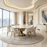 Ensemble de table à manger ronde en marbre avec base en métal doré et chaises en cuir crème pour salle à manger de villa