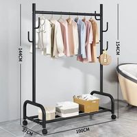 Vente en gros support personnalisé portable sur pied cintres en métal pour chambre à coucher accrocher vêtements porte-manteaux