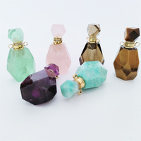 Collier élégant pour femme en forme de flacon de parfum avec pendentif en cristal en forme de cœur, design populaire, potion parfumée