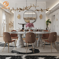 Mesa de Comedor de Estilo Moderno: Tablero Ovalado de Mármol, Base Única Tipo Columna, que Agrega Elegancia a los Espacios de Comedor Contemporáneos