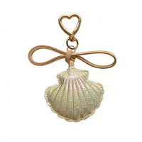 Nouvel Arrivage Porte-clés Créatif en Cuir PU Série Océan Coquillage Pendentif Scintillant Breloque de Sac Féminine Décoration Suspendue pour Voiture